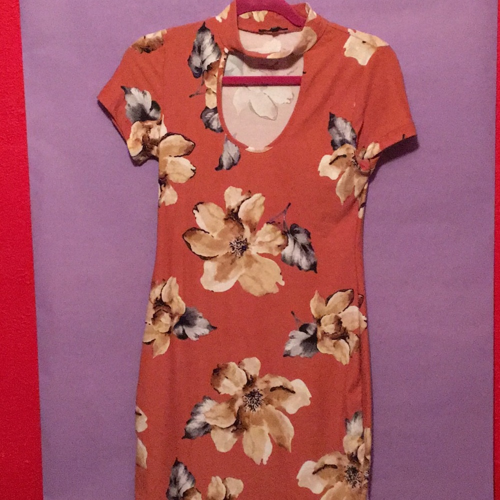 Floral dress color is like a peach brown